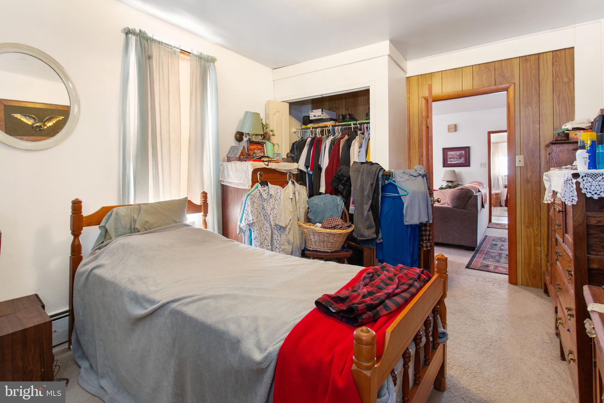 400 Linden Avenue Hanover, PA 17331 - Photo 12 of 43 a bedroom with a bed and a large mirror on the dresser