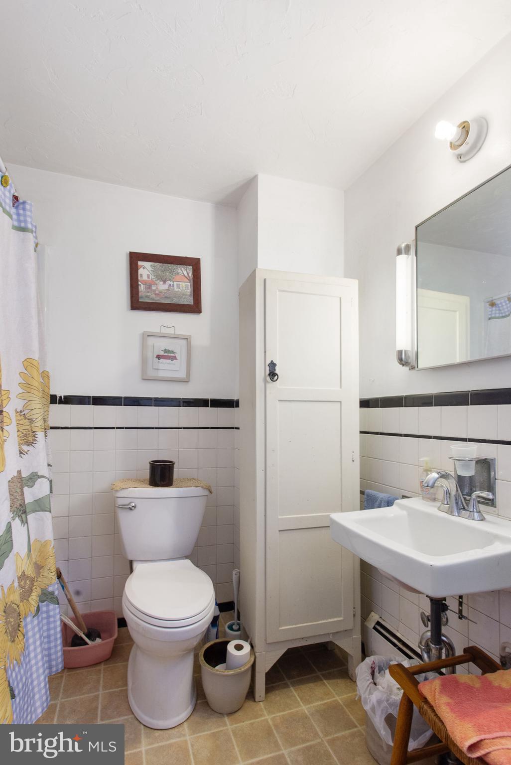 400 Linden Avenue Hanover, PA 17331 - Photo 16 of 43 a bathroom with a toilet sink and mirror