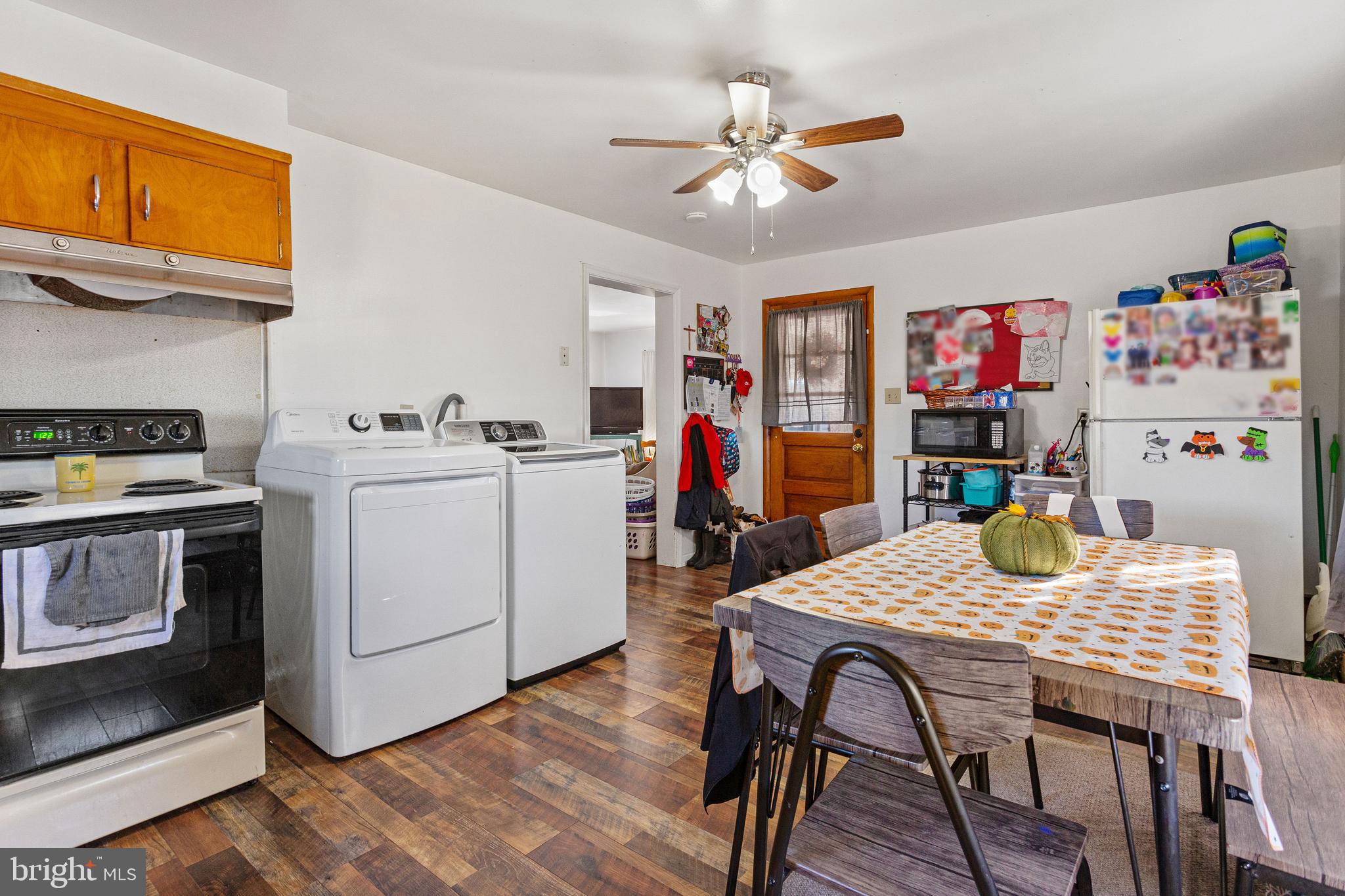 400 Linden Avenue Hanover, PA 17331 - Photo 19 of 43 a view of a dining room with furniture and wooden floor