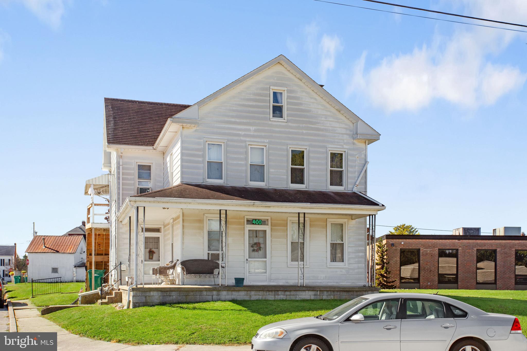 400 Linden Avenue Hanover, PA 17331 - Photo 2 of 43 a front view of a house with a yard