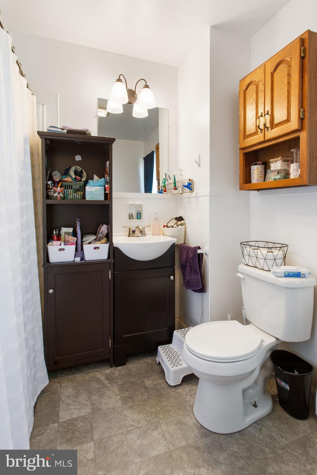 400 Linden Avenue Hanover, PA 17331 - Photo 23 of 43 a bathroom with a sink a toilet and a mirror