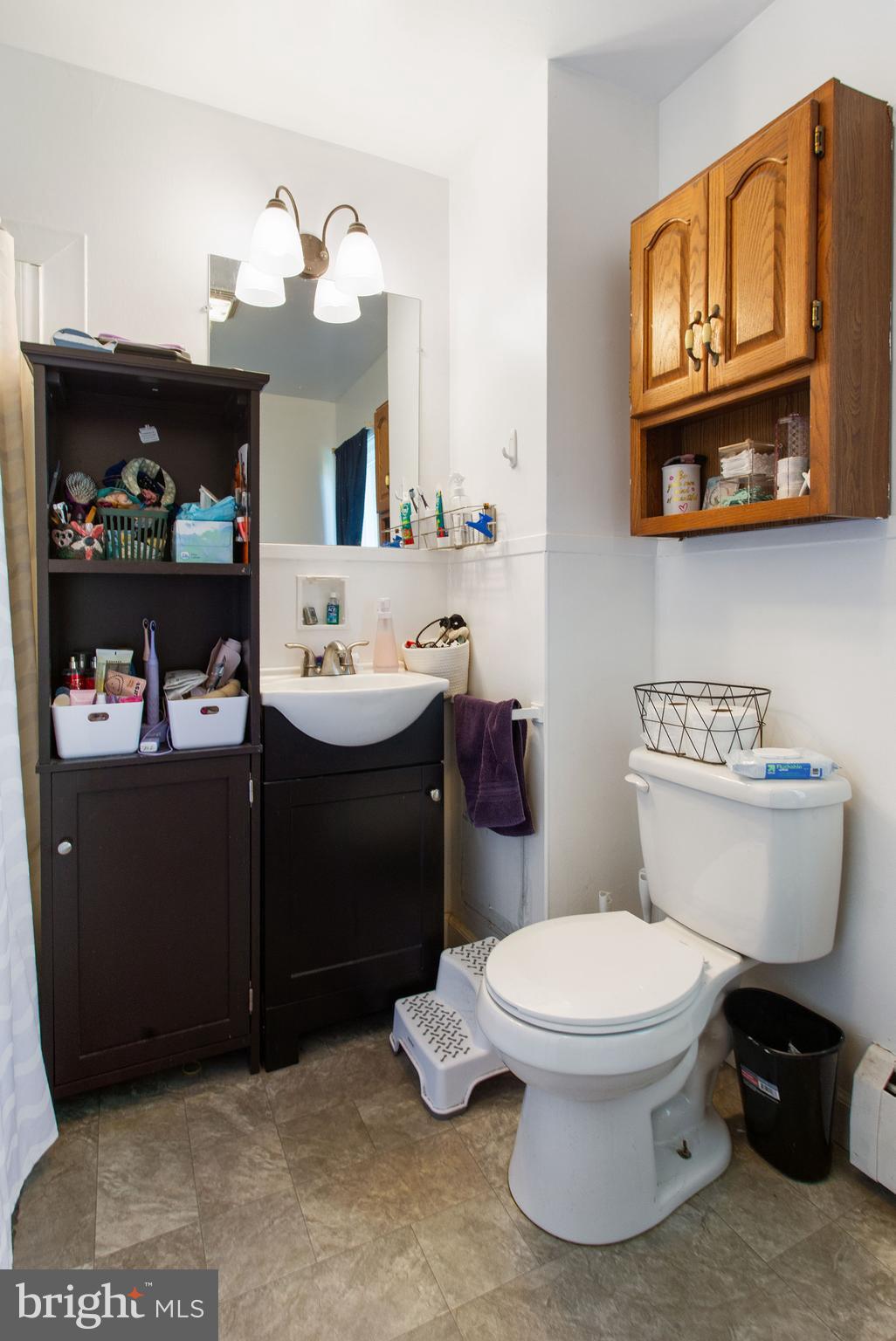 400 Linden Avenue Hanover, PA 17331 - Photo 24 of 43 a bathroom with a toilet a sink and a mirror