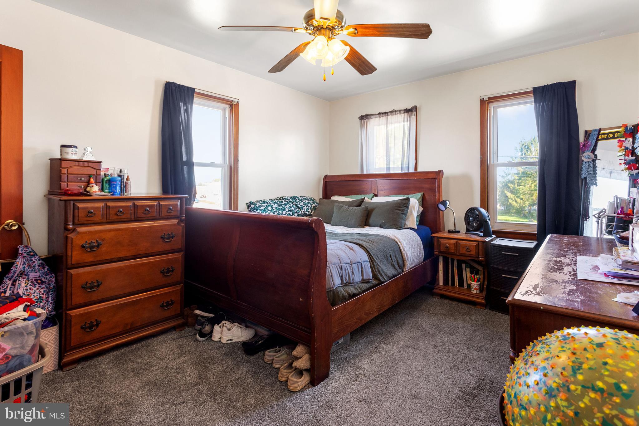 400 Linden Avenue Hanover, PA 17331 - Photo 25 of 43 a bedroom with a bed and a chandelier