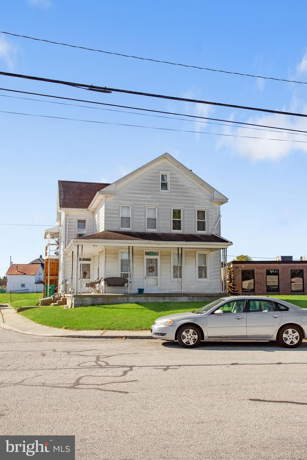 400 Linden Avenue Hanover, PA 17331 - Photo 3 of 43 a car parked in front of a house