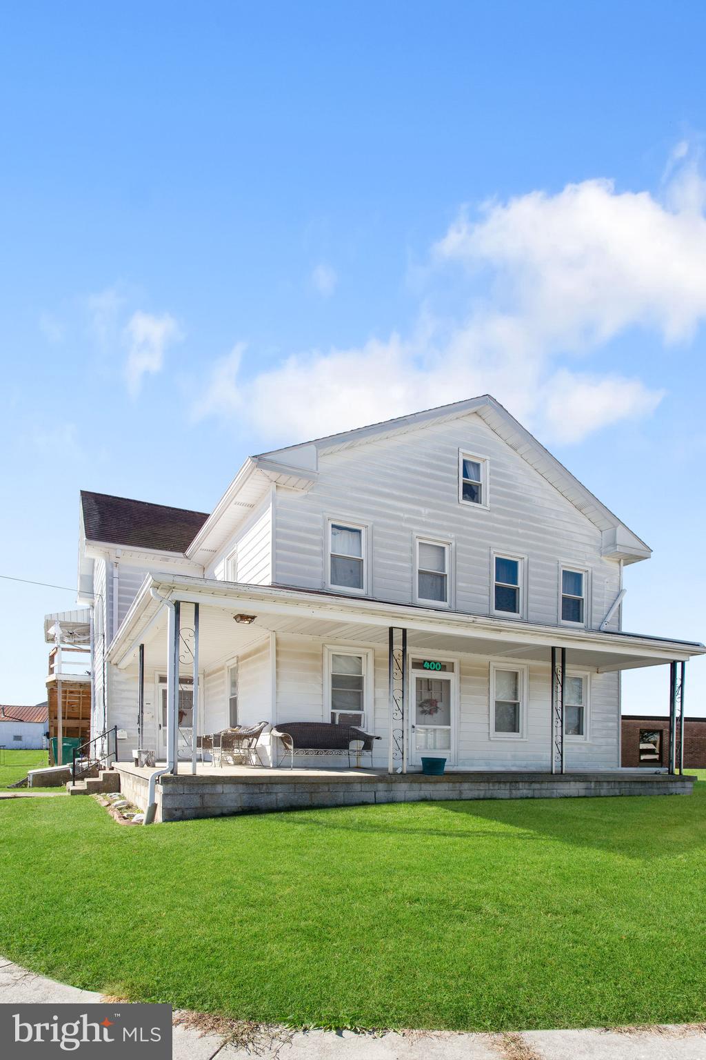 400 Linden Avenue Hanover, PA 17331 - Photo 4 of 43 a view of a house with a big yard and large trees