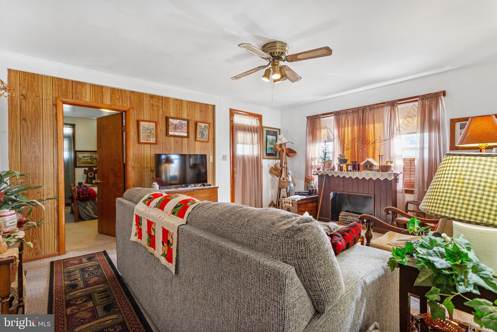 400 Linden Avenue Hanover, PA 17331 - Photo 6 of 43 a living room filled with furniture and a flat screen tv