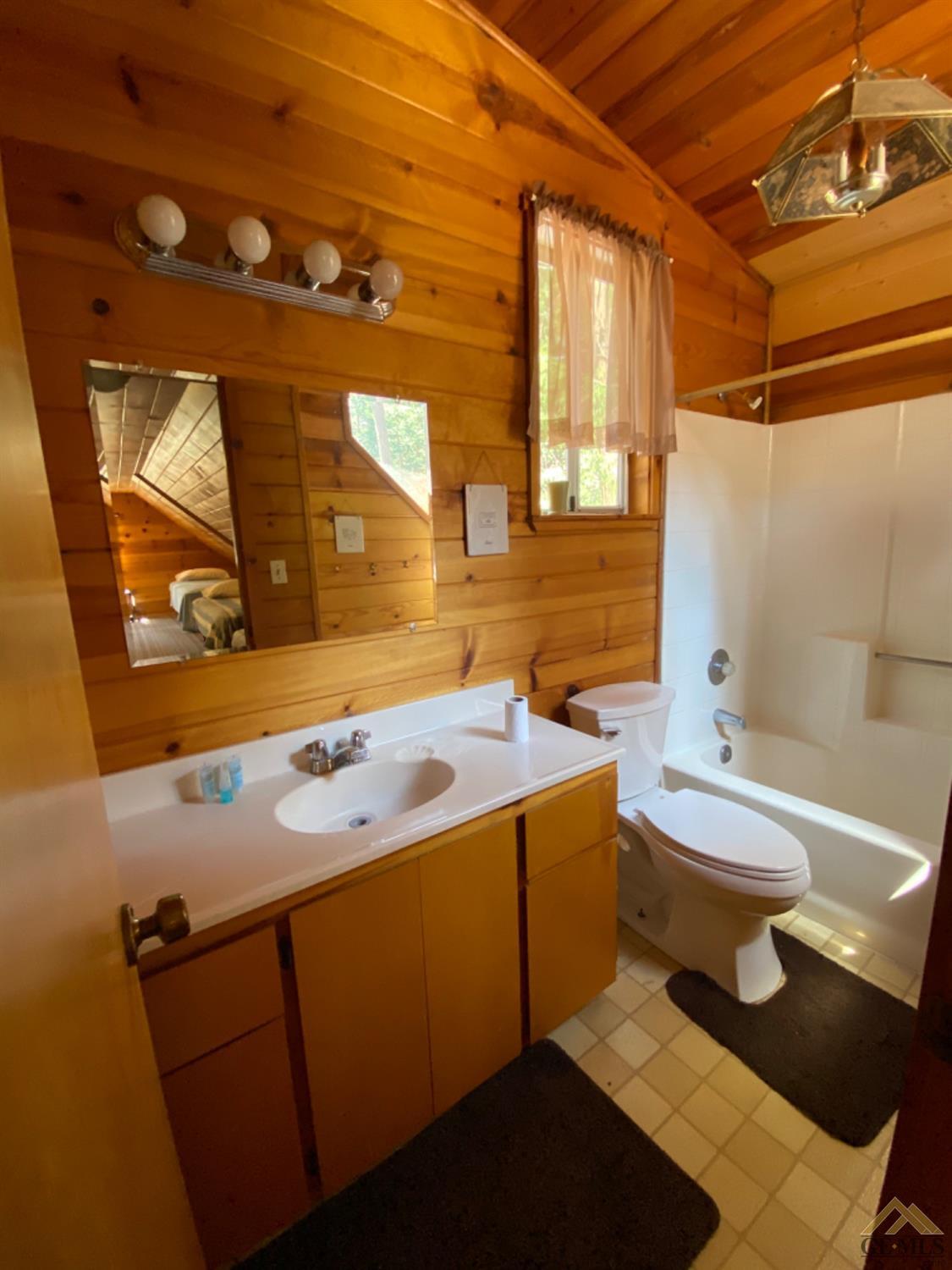 Undisclosed Address Posey, CA 93260 - Photo 18 of 20 a bathroom with a sink a toilet and shower