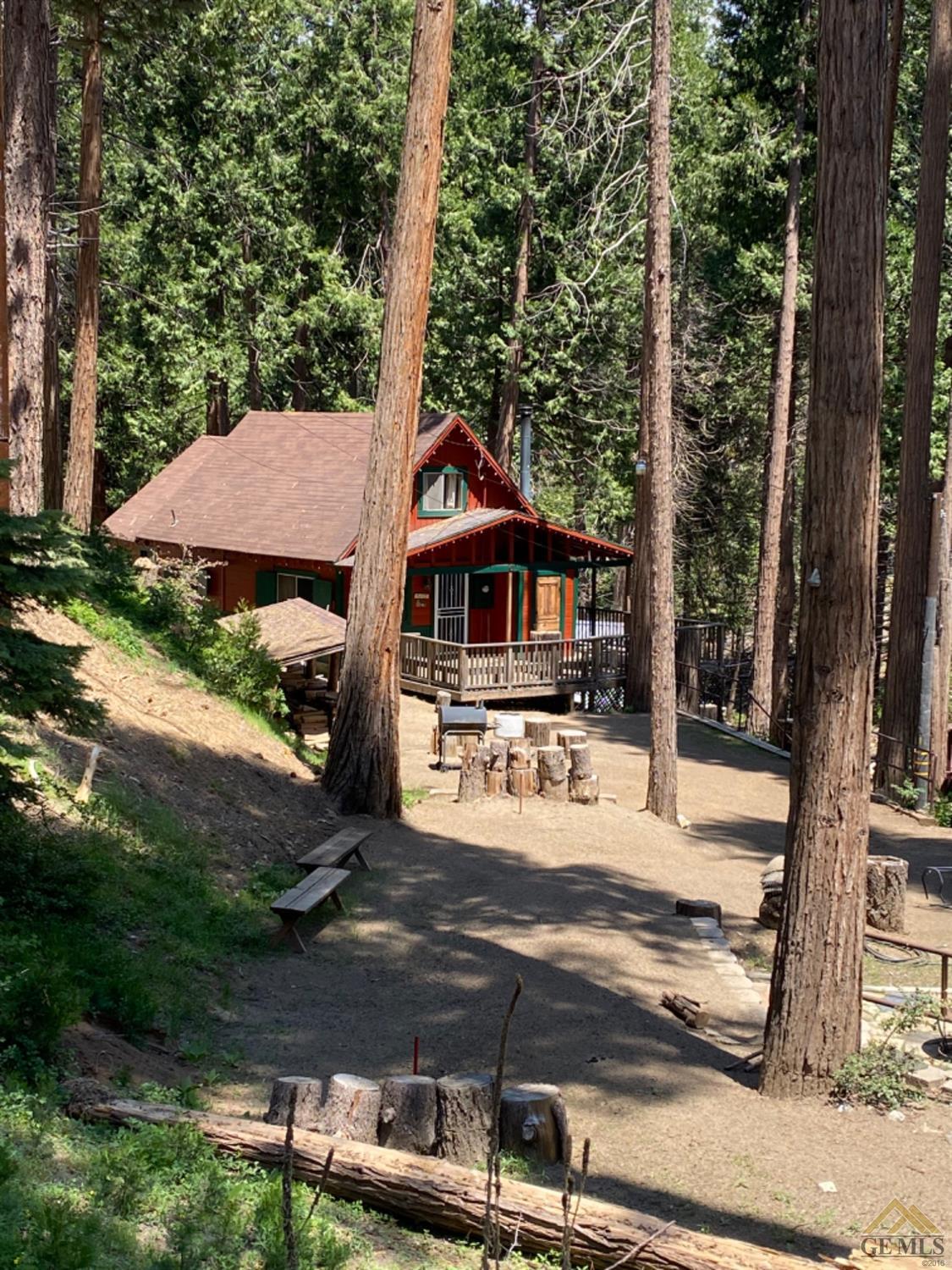 Undisclosed Address Posey, CA 93260 - Photo 20 of 20 a front view of a house with garden