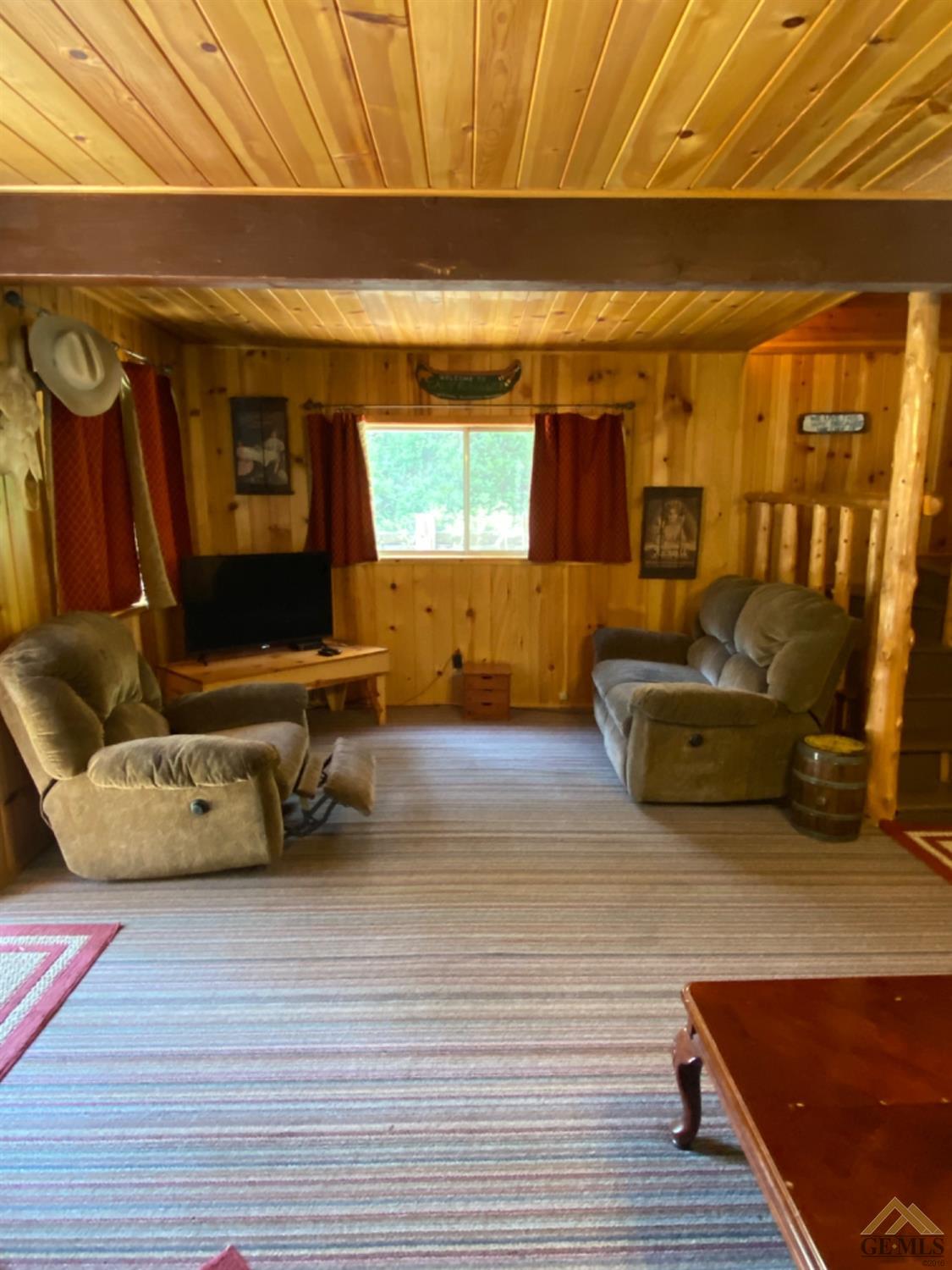 Undisclosed Address Posey, CA 93260 - Photo 3 of 20 a living room with furniture and a flat screen tv