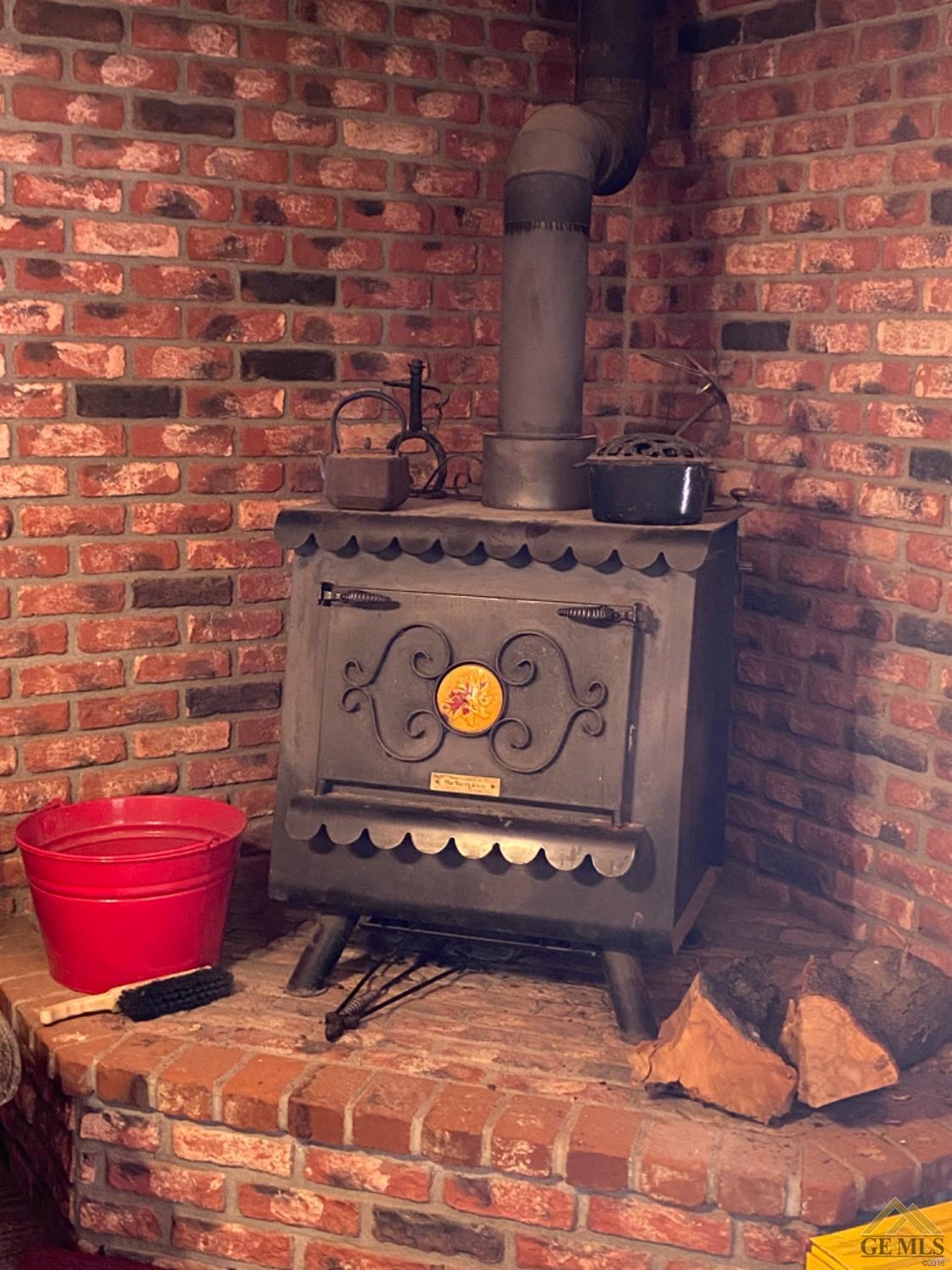 Undisclosed Address Posey, CA 93260 - Photo 5 of 20 a stove top oven sitting inside of a kitchen