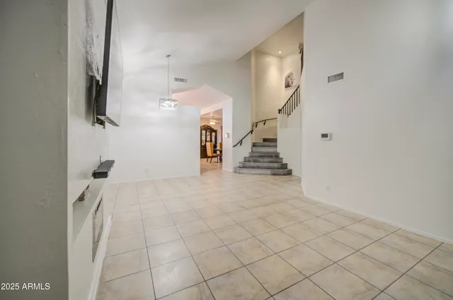 a view of a livingroom with a staircase