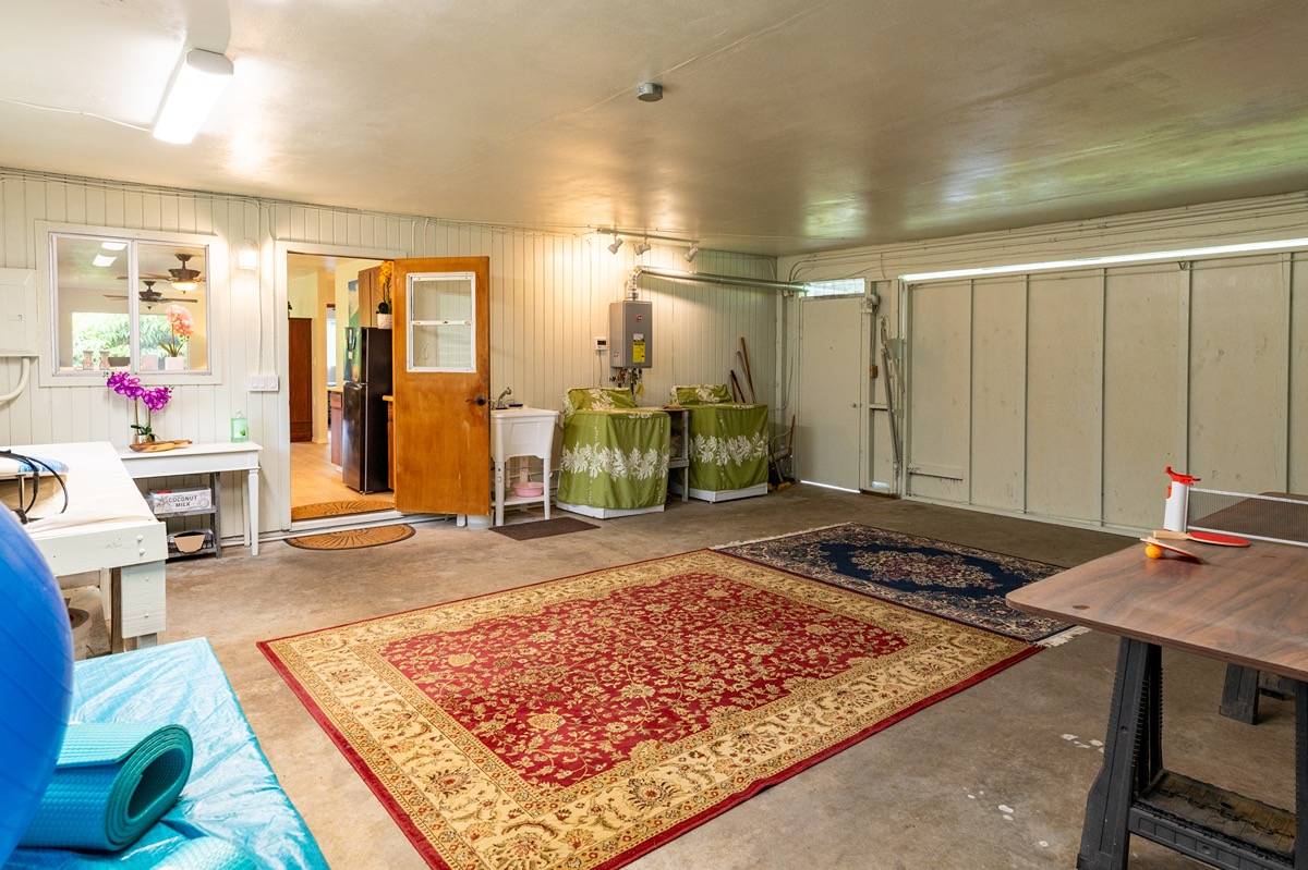 16-1404 Hopue Road Mountain View, HI 96771 - Photo 15 of 28 a living room with rug floor and furniture