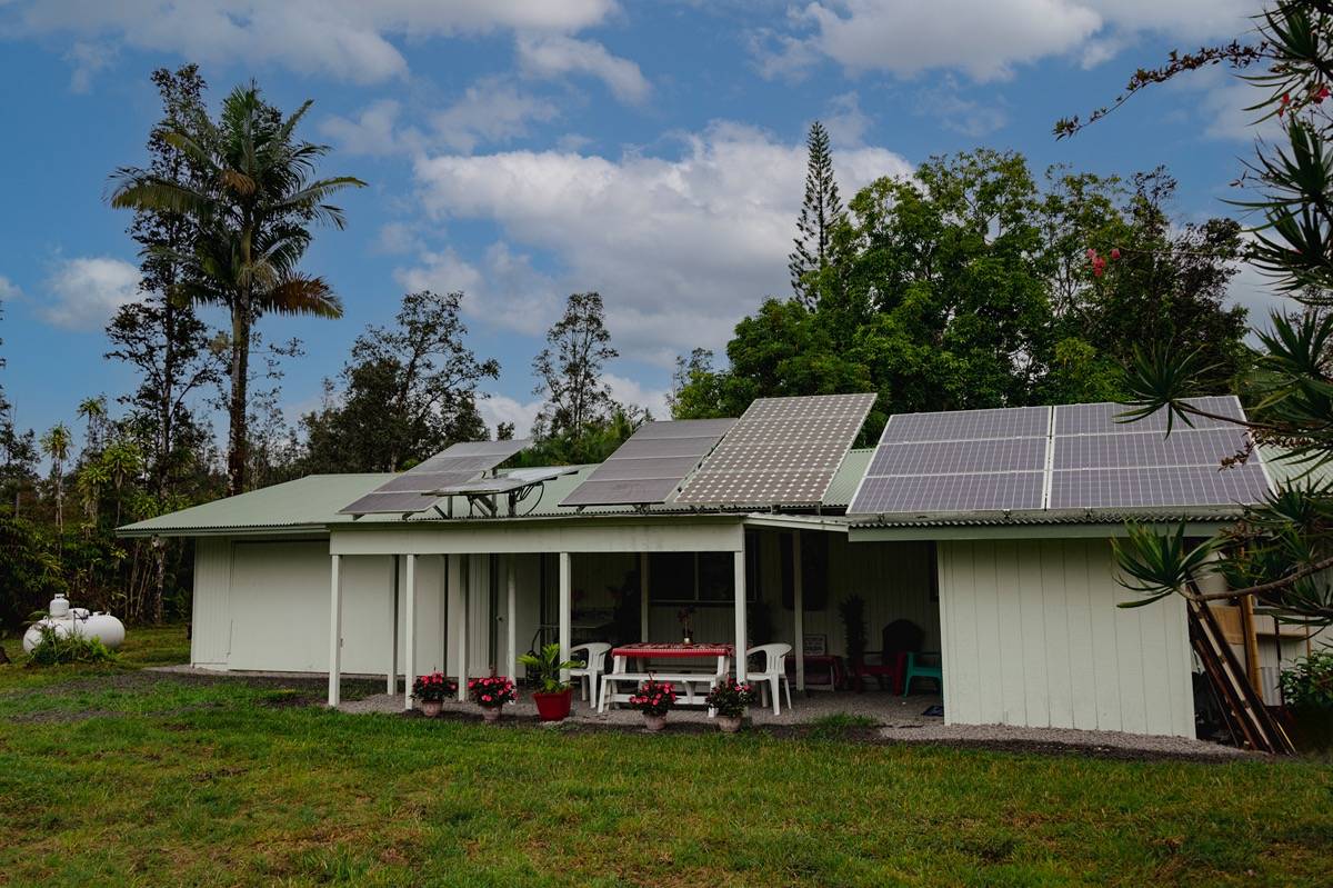 16-1404 Hopue Road Mountain View, HI 96771 - Photo 18 of 28 a view of a house with pool and a yard