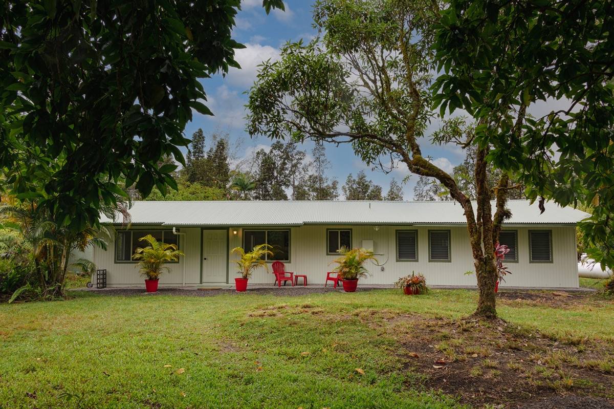 16-1404 Hopue Road Mountain View, HI 96771 - Photo 2 of 28 a view of a house with a yard