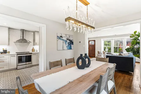 a kitchen with a table and chairs