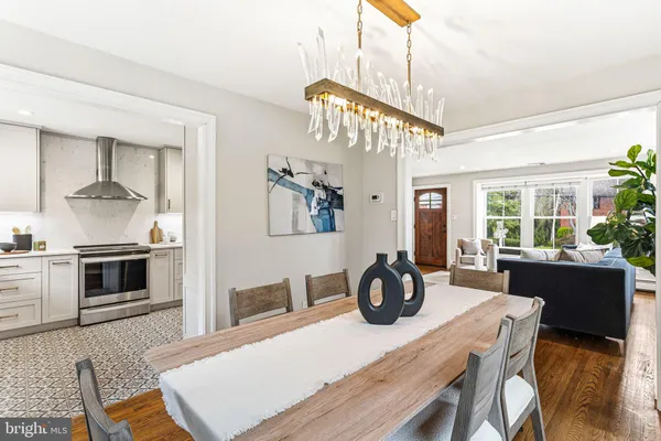 a kitchen with a table and chairs