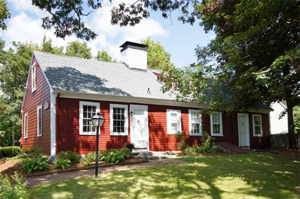 front view of a house with a yard