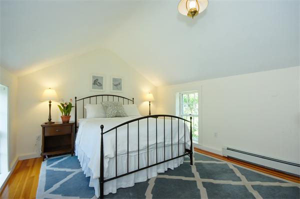 137 North Road Bedford, MA 01730 - Photo 14 of 23 a view of a livingroom with furniture and stairs