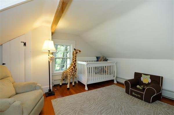 137 North Road Bedford, MA 01730 - Photo 18 of 23 a bedroom with furniture and a wooden floor