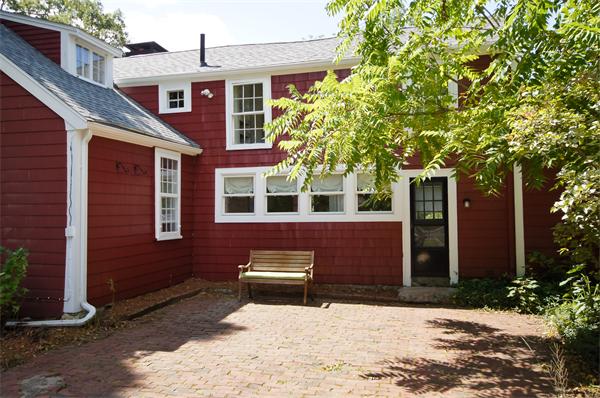 137 North Road Bedford, MA 01730 - Photo 19 of 23 a front view of a house with a yard