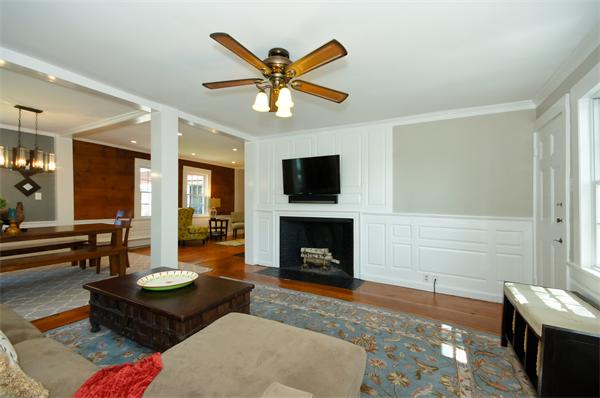 137 North Road Bedford, MA 01730 - Photo 4 of 23 a living room with furniture and a fireplace