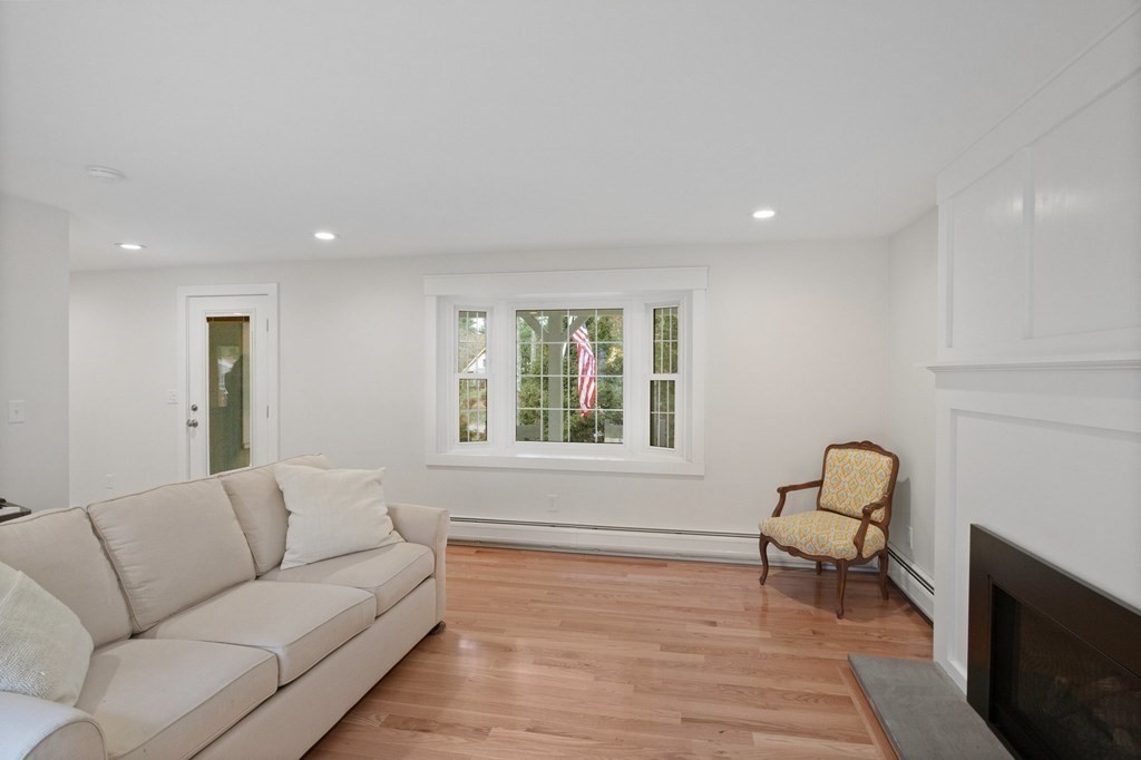 29 Stuart Road Rochester, MA 02770 - Photo 17 of 41 a living room with furniture and a window
