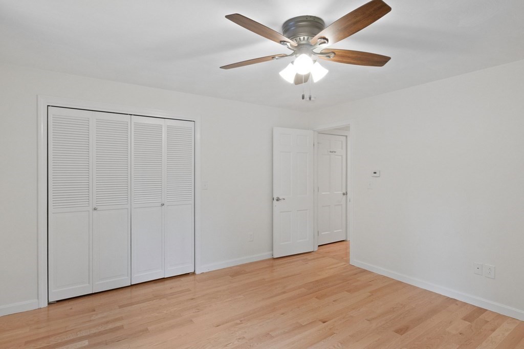29 Stuart Road Rochester, MA 02770 - Photo 27 of 41 wooden floor in an empty room