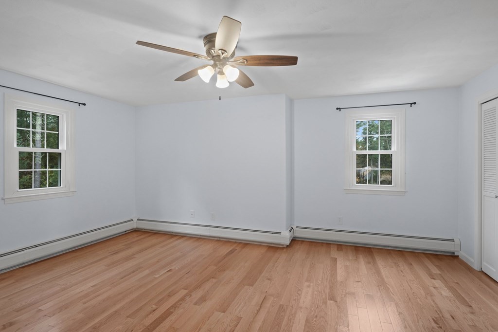 29 Stuart Road Rochester, MA 02770 - Photo 31 of 41 a view of a room with wooden floor and window