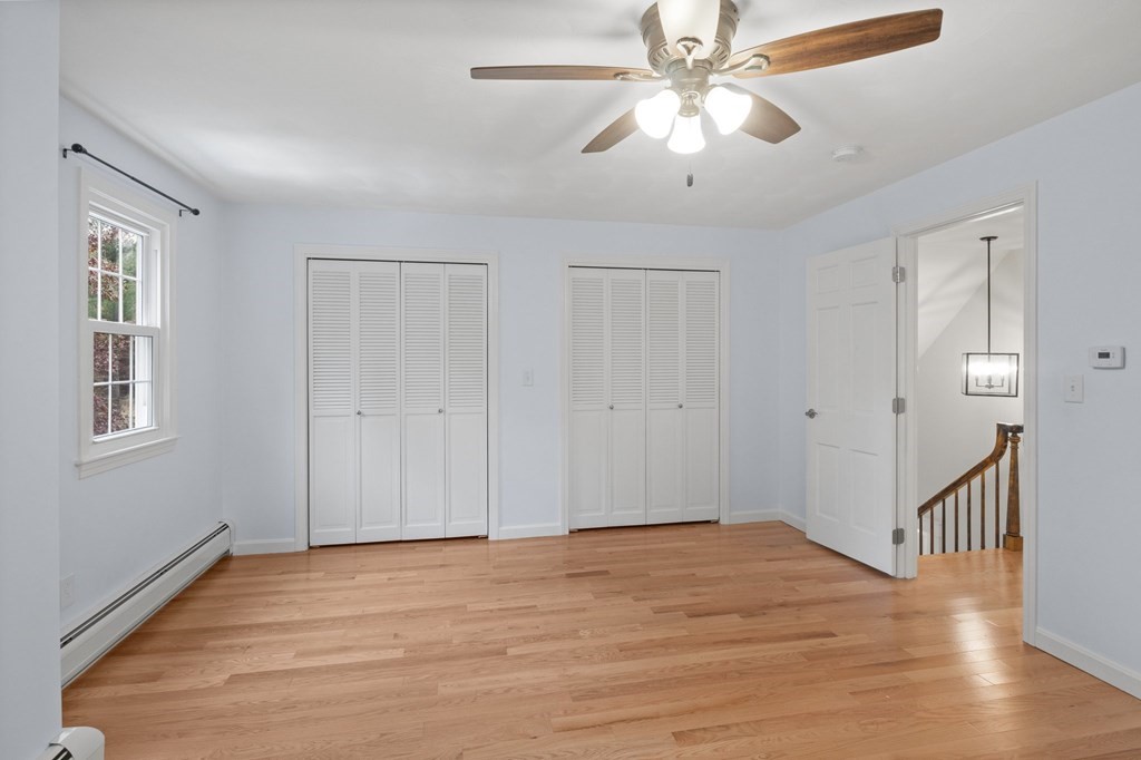 29 Stuart Road Rochester, MA 02770 - Photo 32 of 41 a view of empty room with wooden floor
