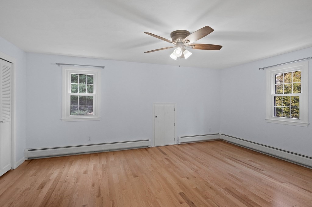 29 Stuart Road Rochester, MA 02770 - Photo 33 of 41 a view of a room with wooden floor and windows