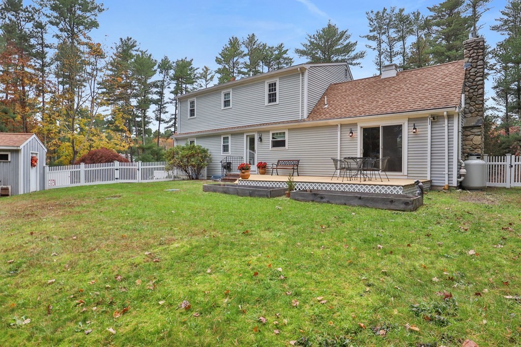 29 Stuart Road Rochester, MA 02770 - Photo 39 of 41 a front view of a house with a yard