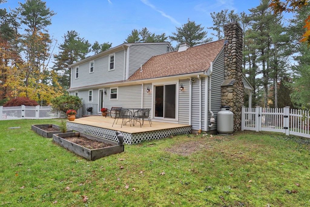 29 Stuart Road Rochester, MA 02770 - Photo 40 of 41 a view of a house with a yard and sitting area