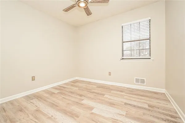 an empty room with a window