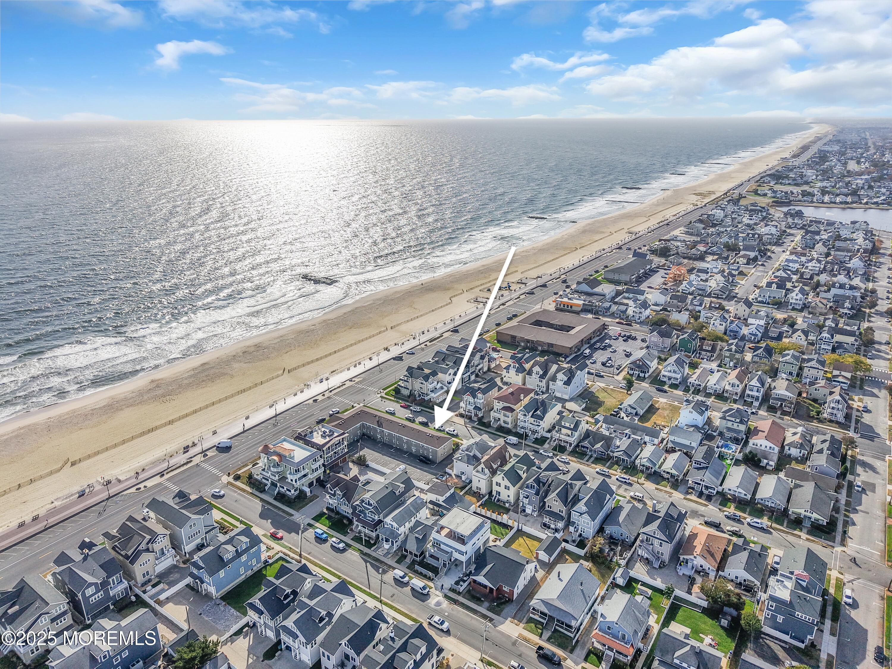 1304 Ocean Avenue, Unit 2A Belmar, NJ 07719 - Photo 23 of 25 a view of an ocean and beach