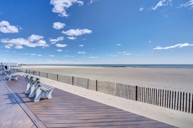 a view of a balcony with wooden floor
