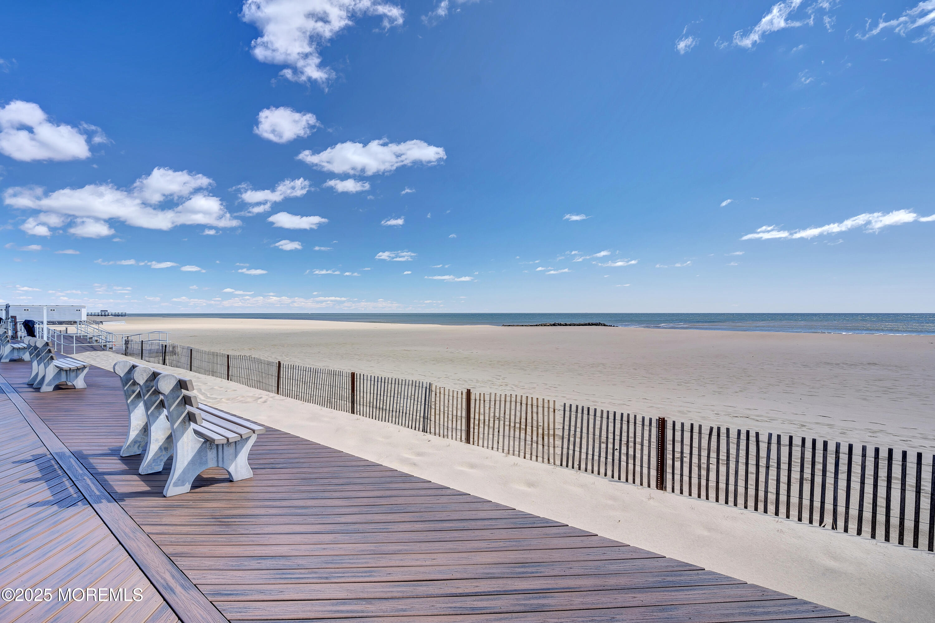 1304 Ocean Avenue, Unit 2A Belmar, NJ 07719 - Photo 25 of 25 a view of a balcony with wooden floor