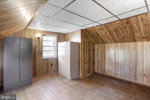 a bathroom with a toilet a sink and a shower