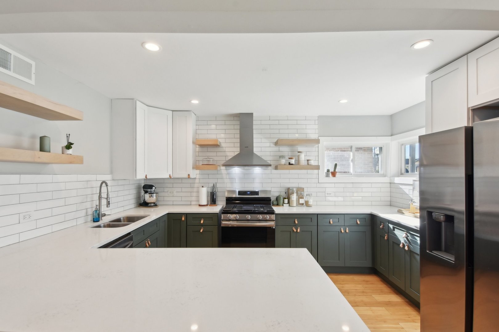 5709 South Austin Avenue Chicago, IL 60638 - Photo 11 of 30 a kitchen with stainless steel appliances granite countertop a sink stove and refrigerator