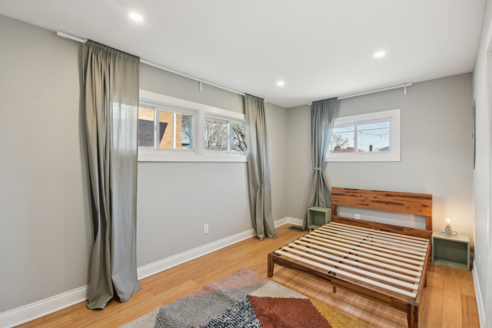 5709 South Austin Avenue Chicago, IL 60638 - Photo 15 of 30 a bedroom with a bed and a window