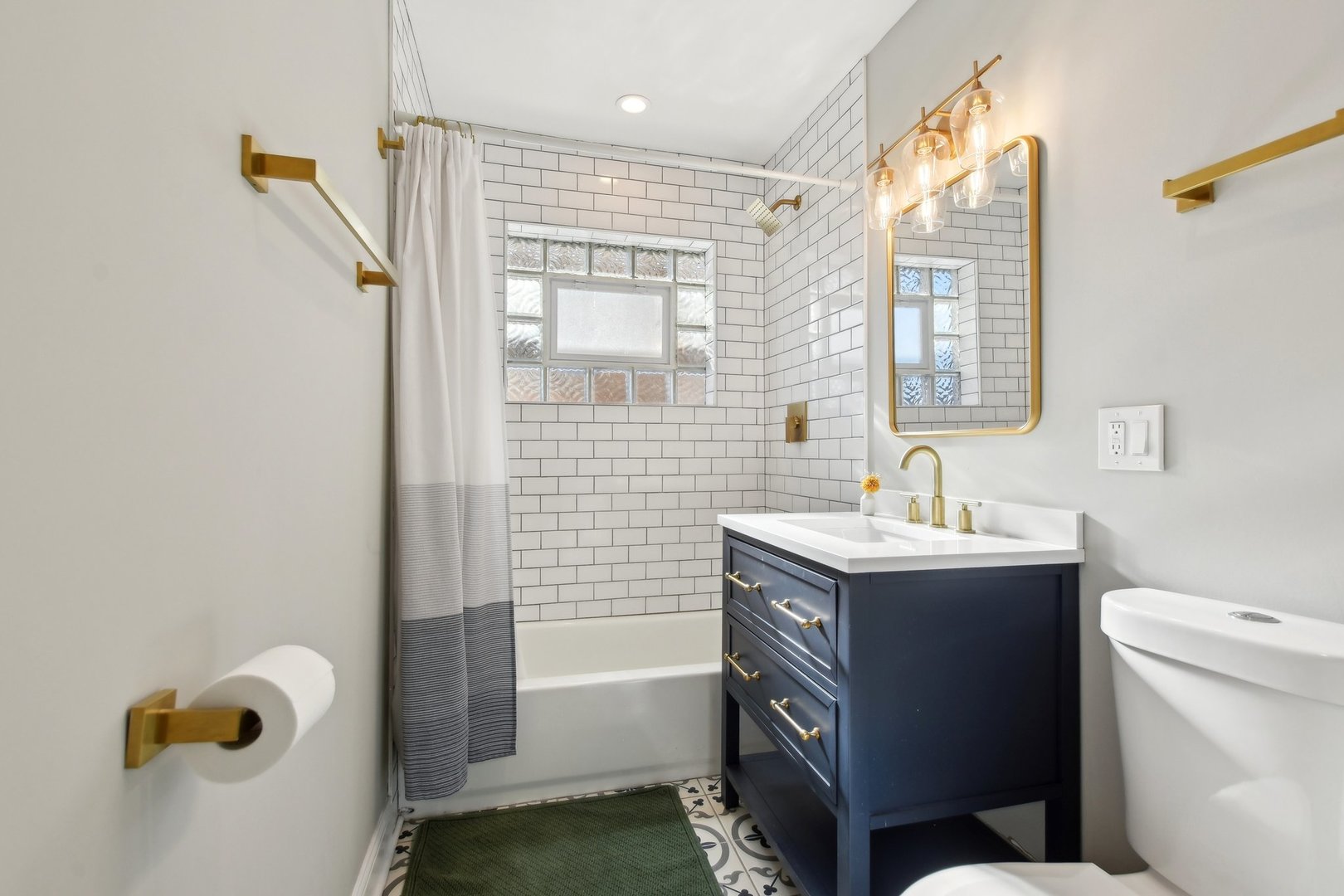 5709 South Austin Avenue Chicago, IL 60638 - Photo 17 of 30 a bathroom with a sink a toilet and shower