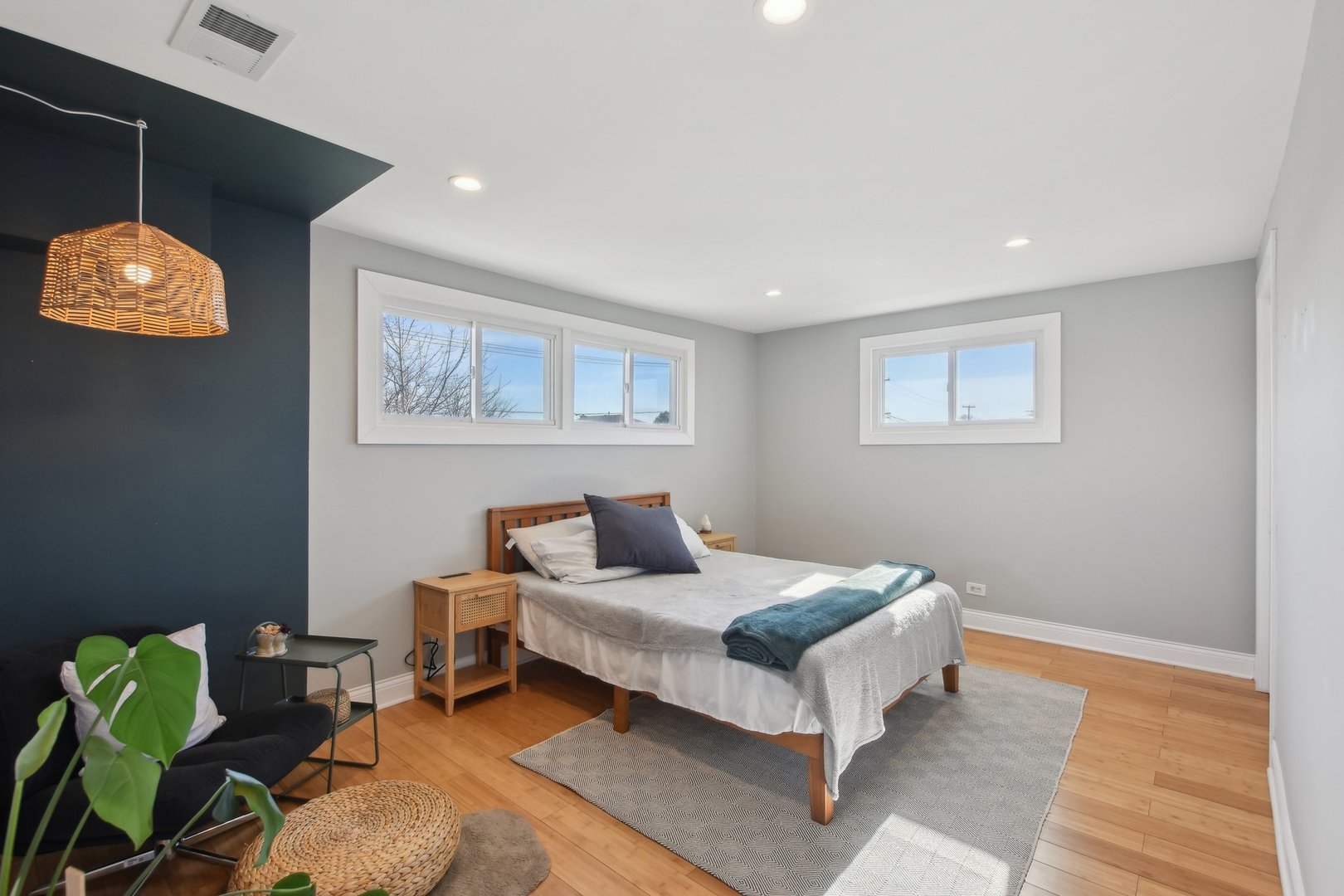 5709 South Austin Avenue Chicago, IL 60638 - Photo 20 of 30 a bedroom with a bed and painting on the wall