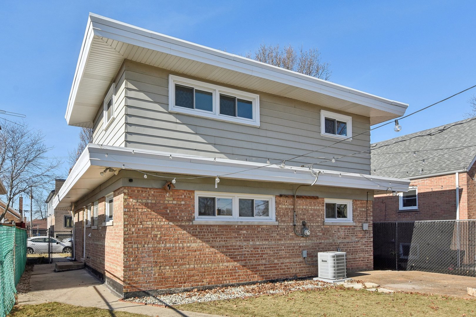 5709 South Austin Avenue Chicago, IL 60638 - Photo 26 of 30 a front view of a house with a yard