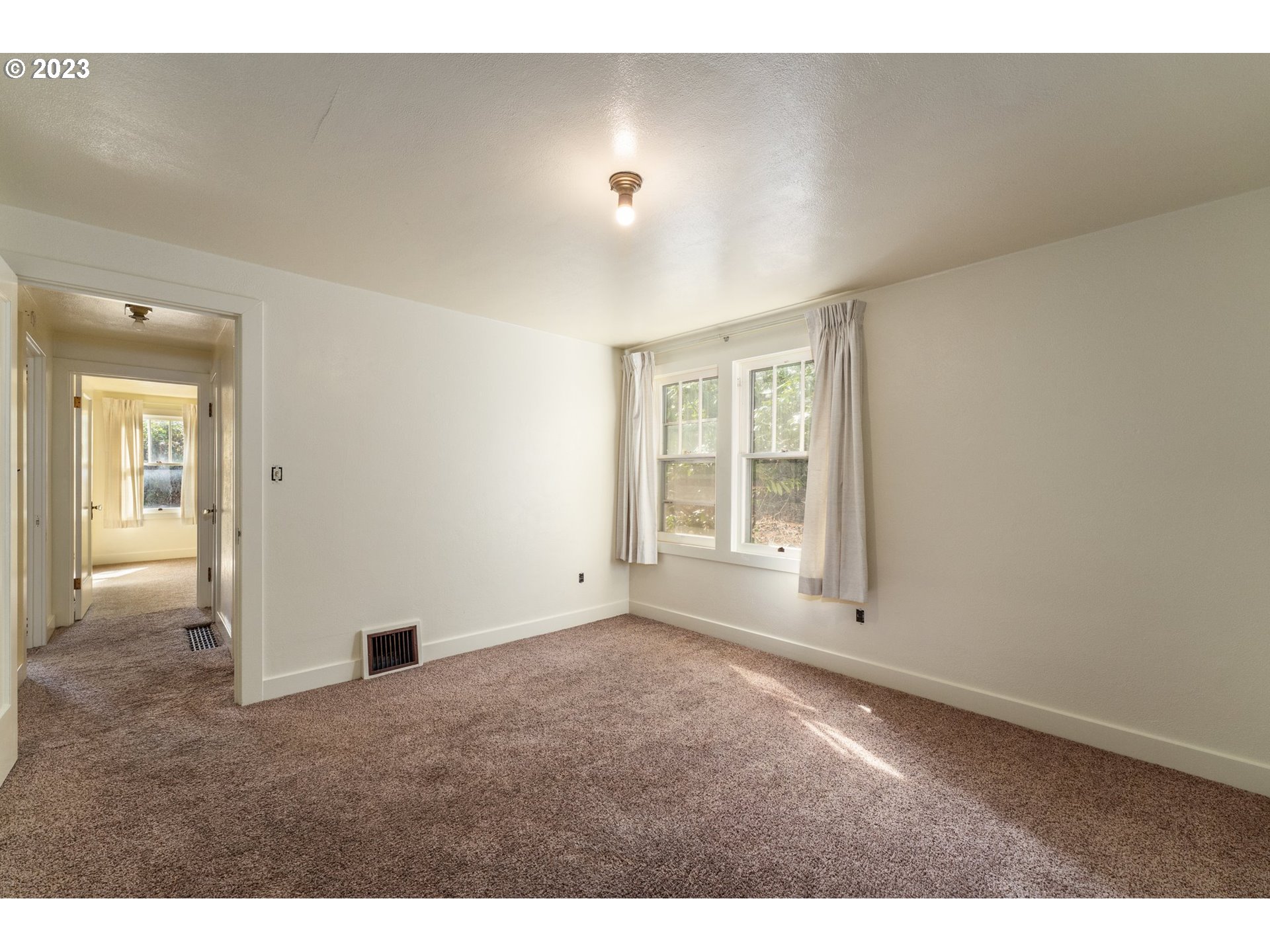 3148 Willamette Street Eugene, OR 97405 - Photo 16 of 31 a view of an empty room with a window