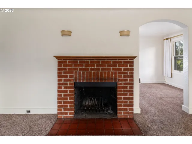 a living room with a fireplace