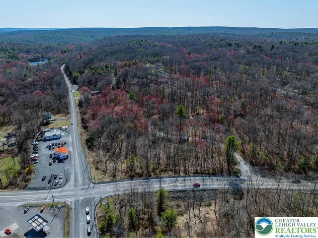 an aerial view of house with outdoor space