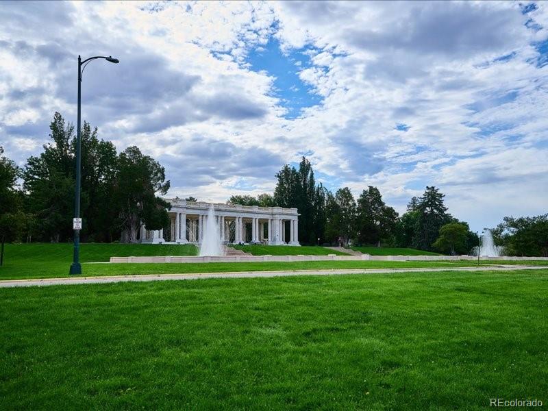 1133 Race Street, Unit 5A Denver, CO 80206 - Photo 29 of 33 a front view of a house with a yard table and chairs