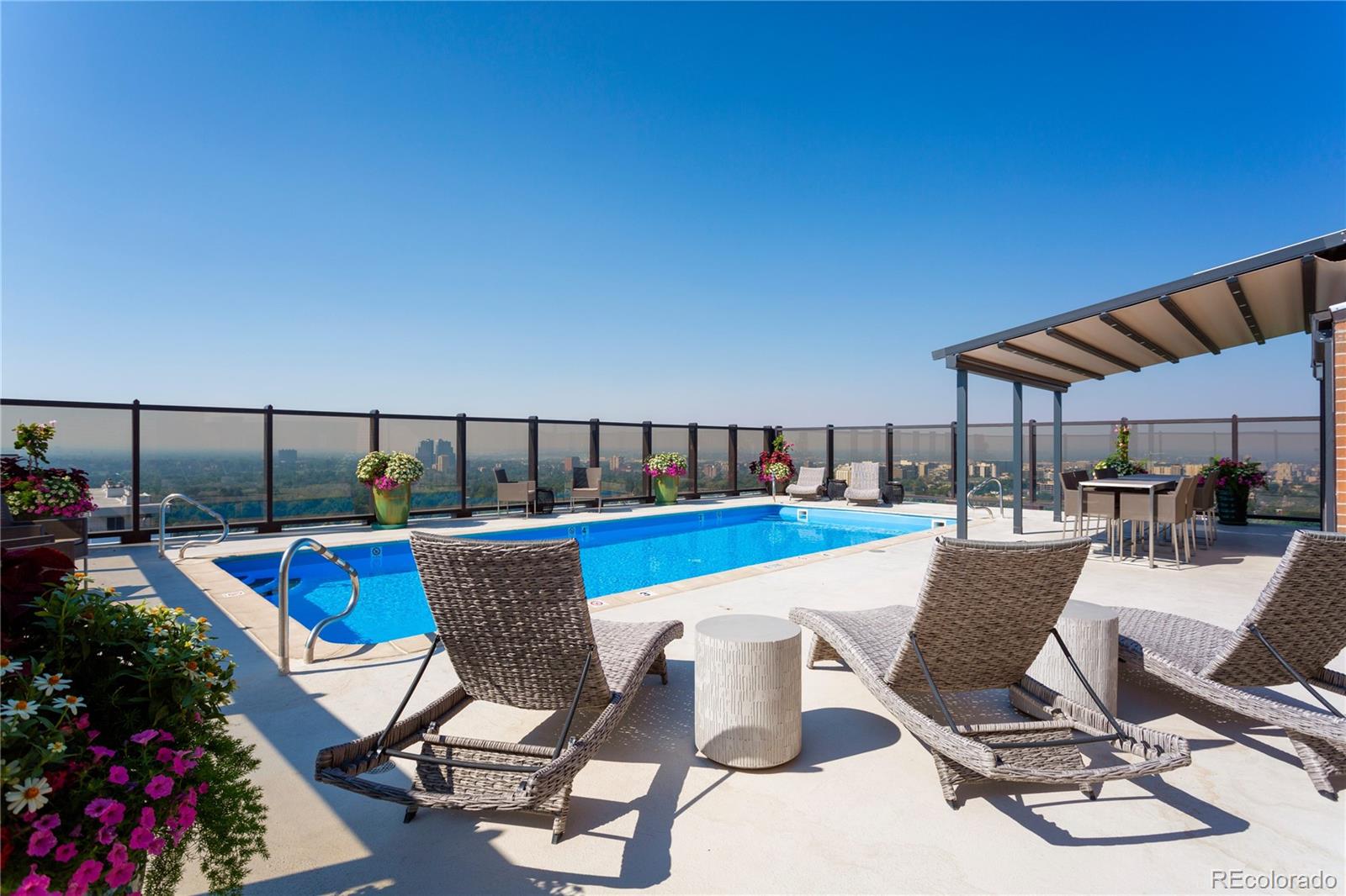 1133 Race Street, Unit 5A Denver, CO 80206 - Photo 3 of 33 a view of a chairs and table in the patio