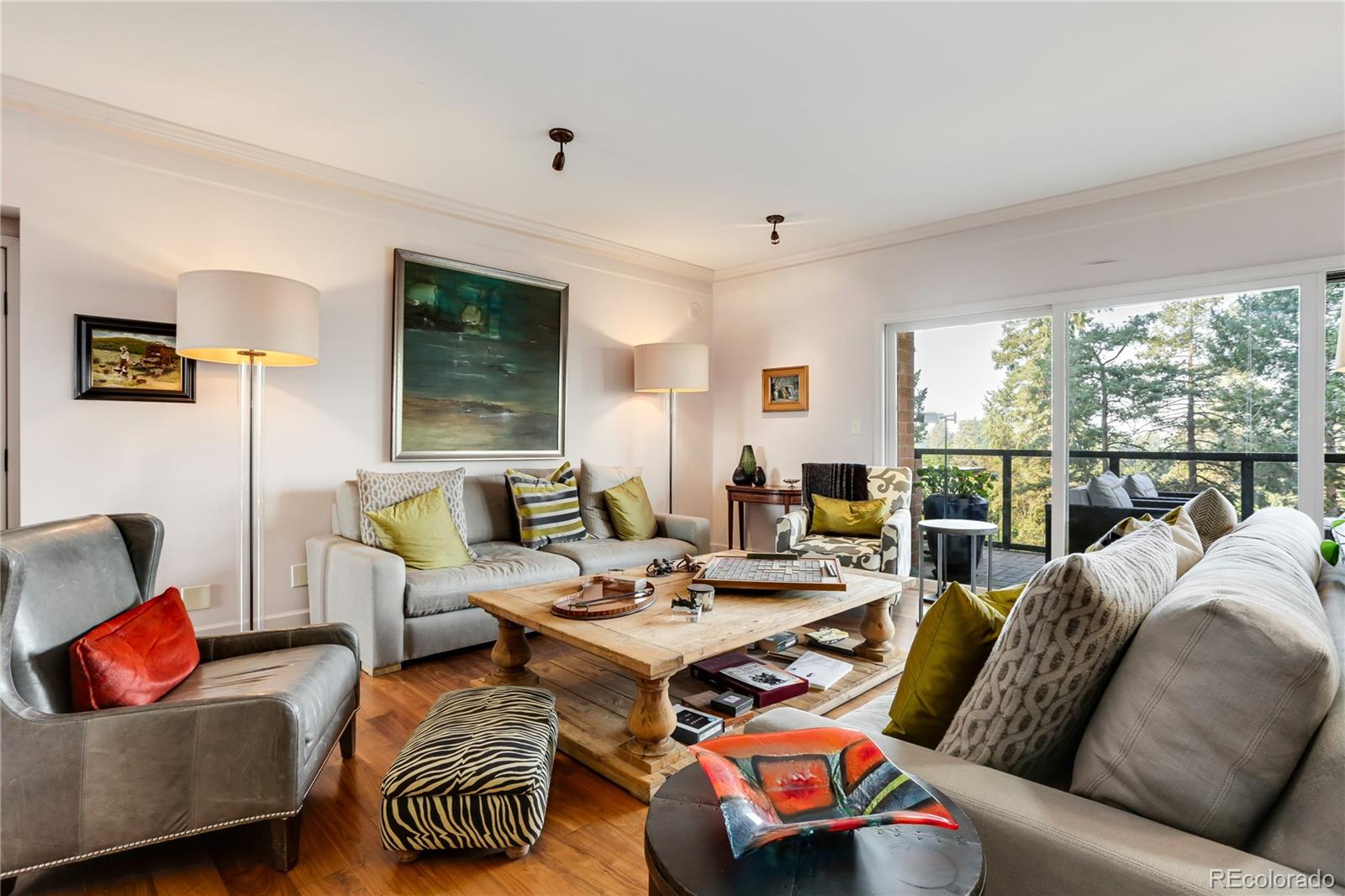 1133 Race Street, Unit 5A Denver, CO 80206 - Photo 6 of 33 a living room with furniture and a window