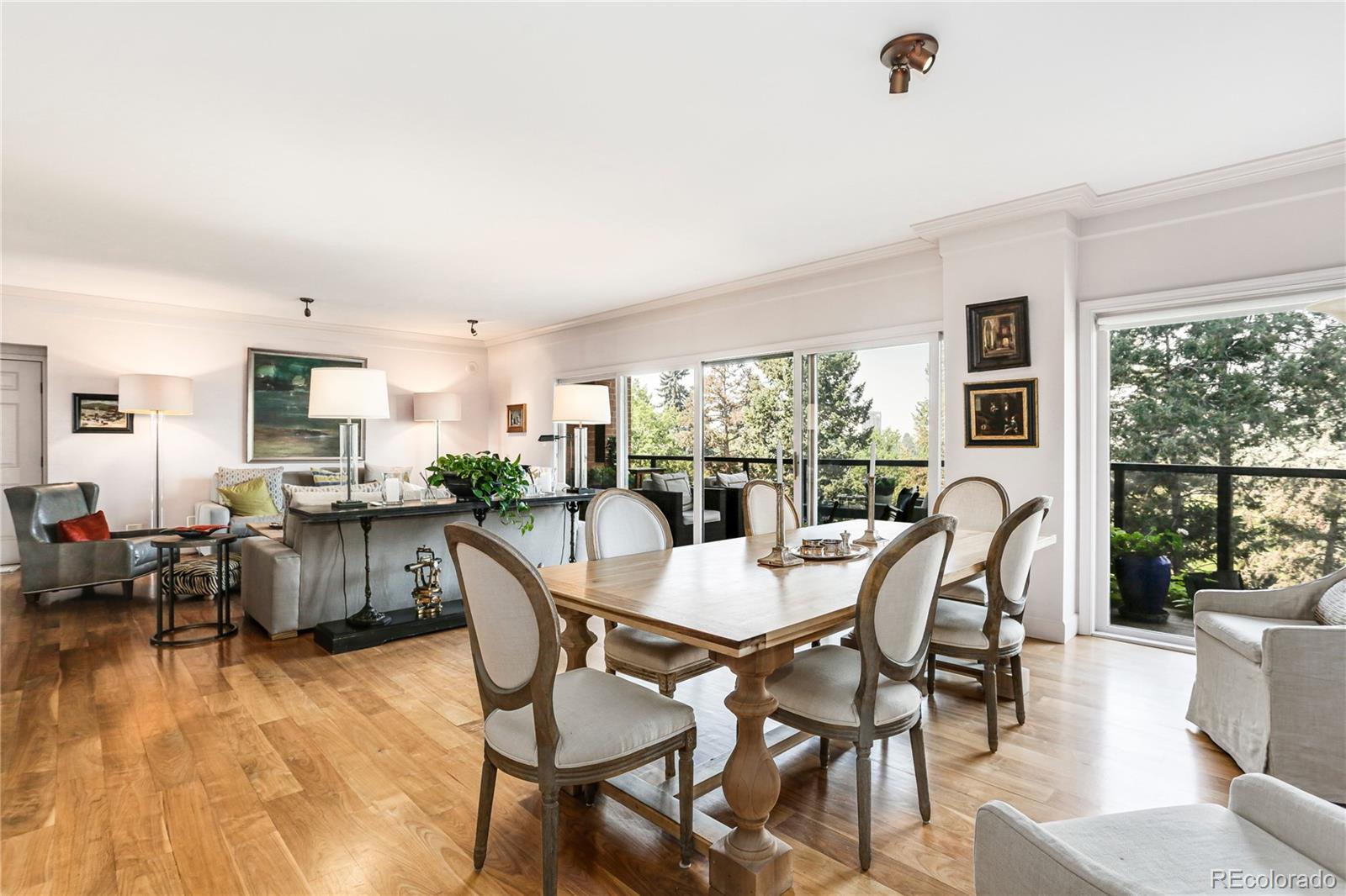 1133 Race Street, Unit 5A Denver, CO 80206 - Photo 9 of 33 a dining room with furniture window and wooden floor