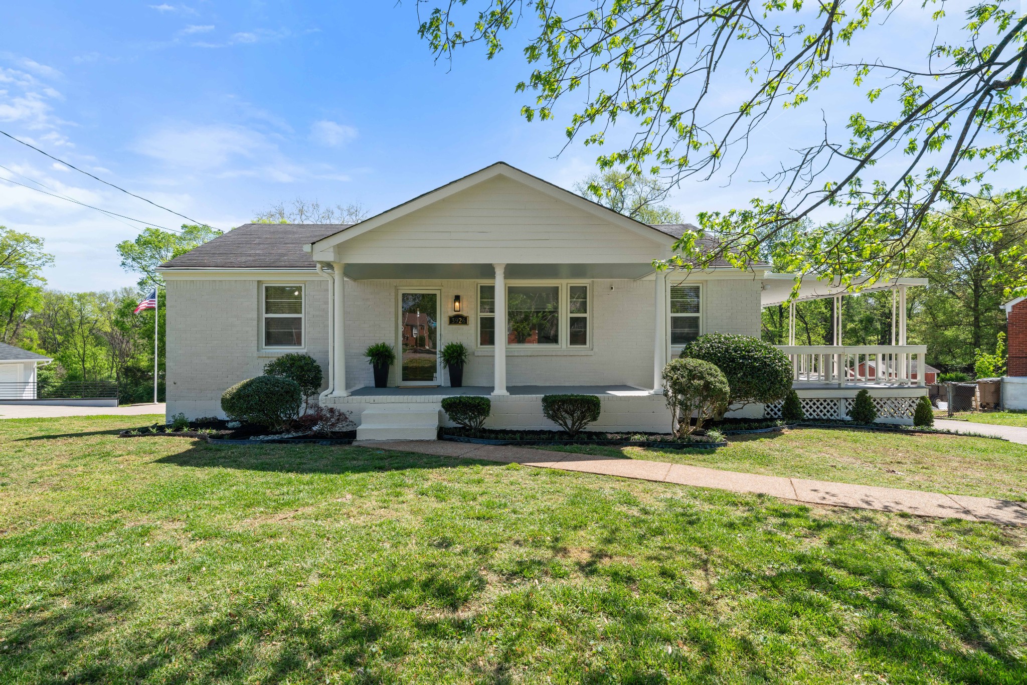 3926 East Ridge Drive Nashville, TN 37211 - Photo 3 of 38 a view of a house with a yard and sitting area